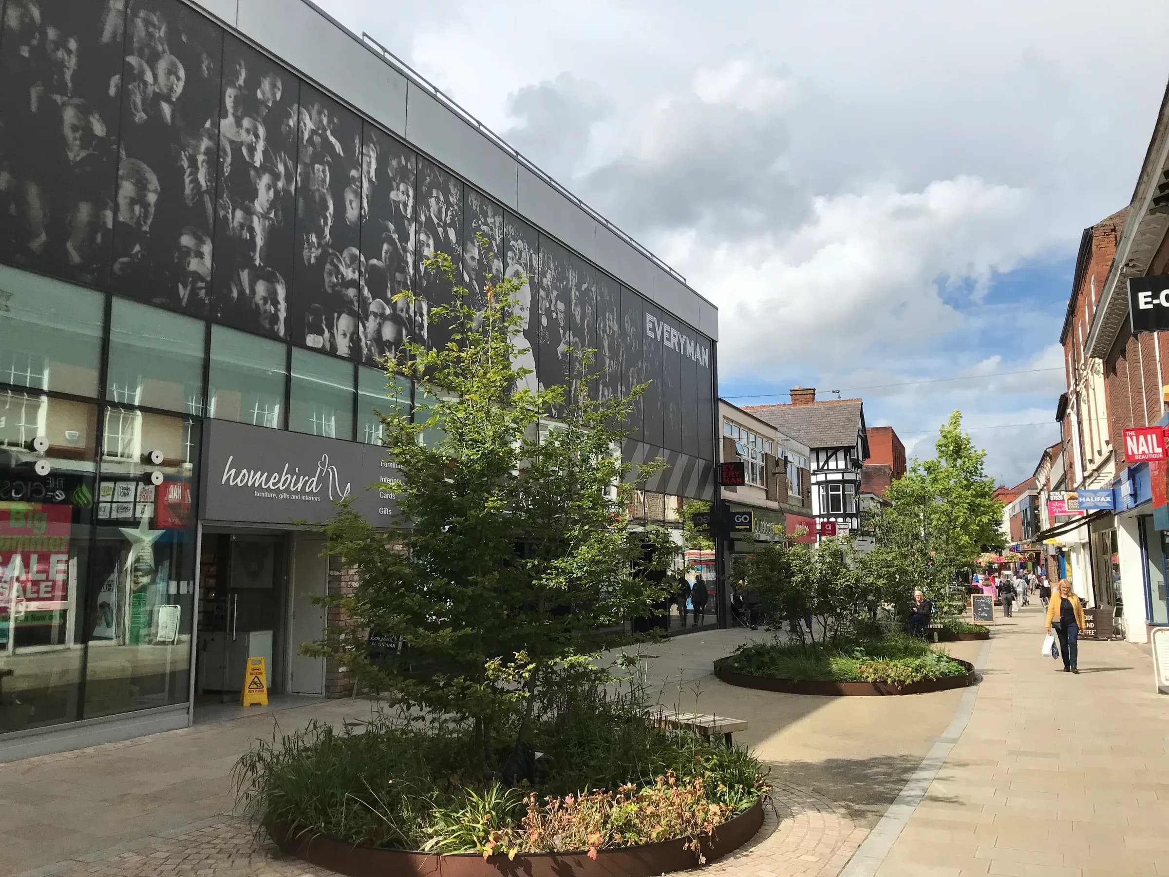 Altrincham town square, with the market building behind it.