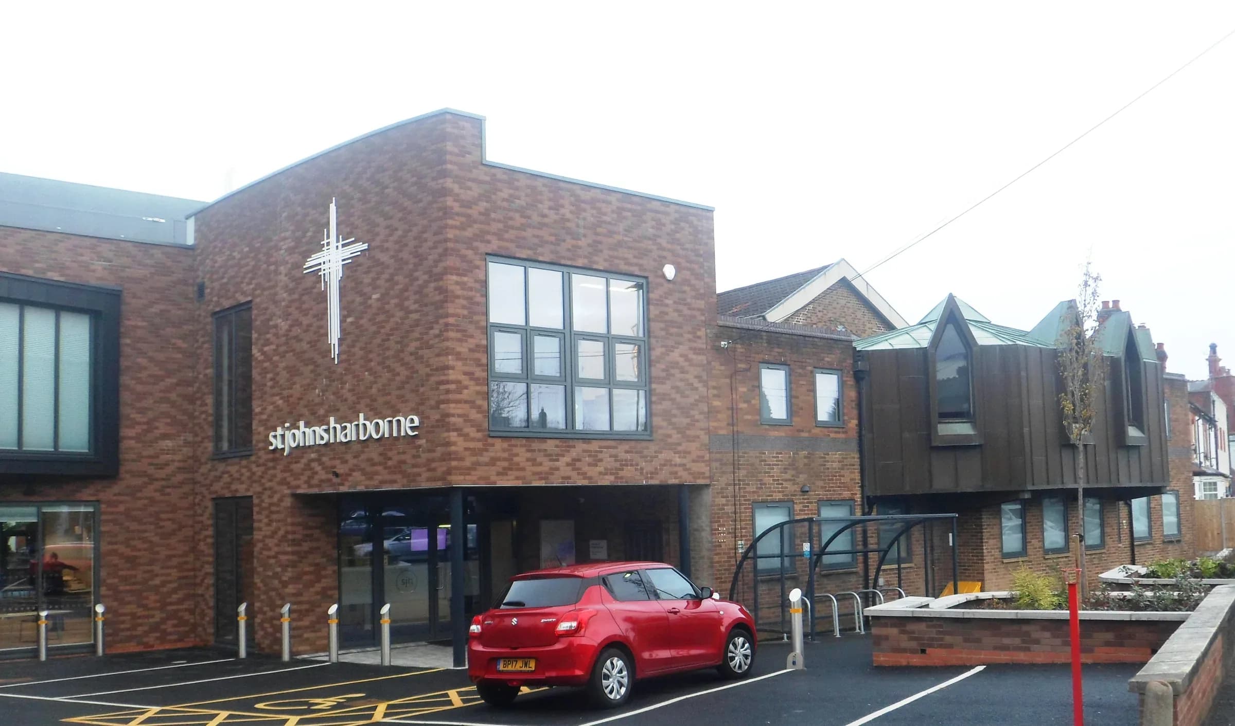 St John’s Church on Harborne High Street, seen from the pavement opposite.
