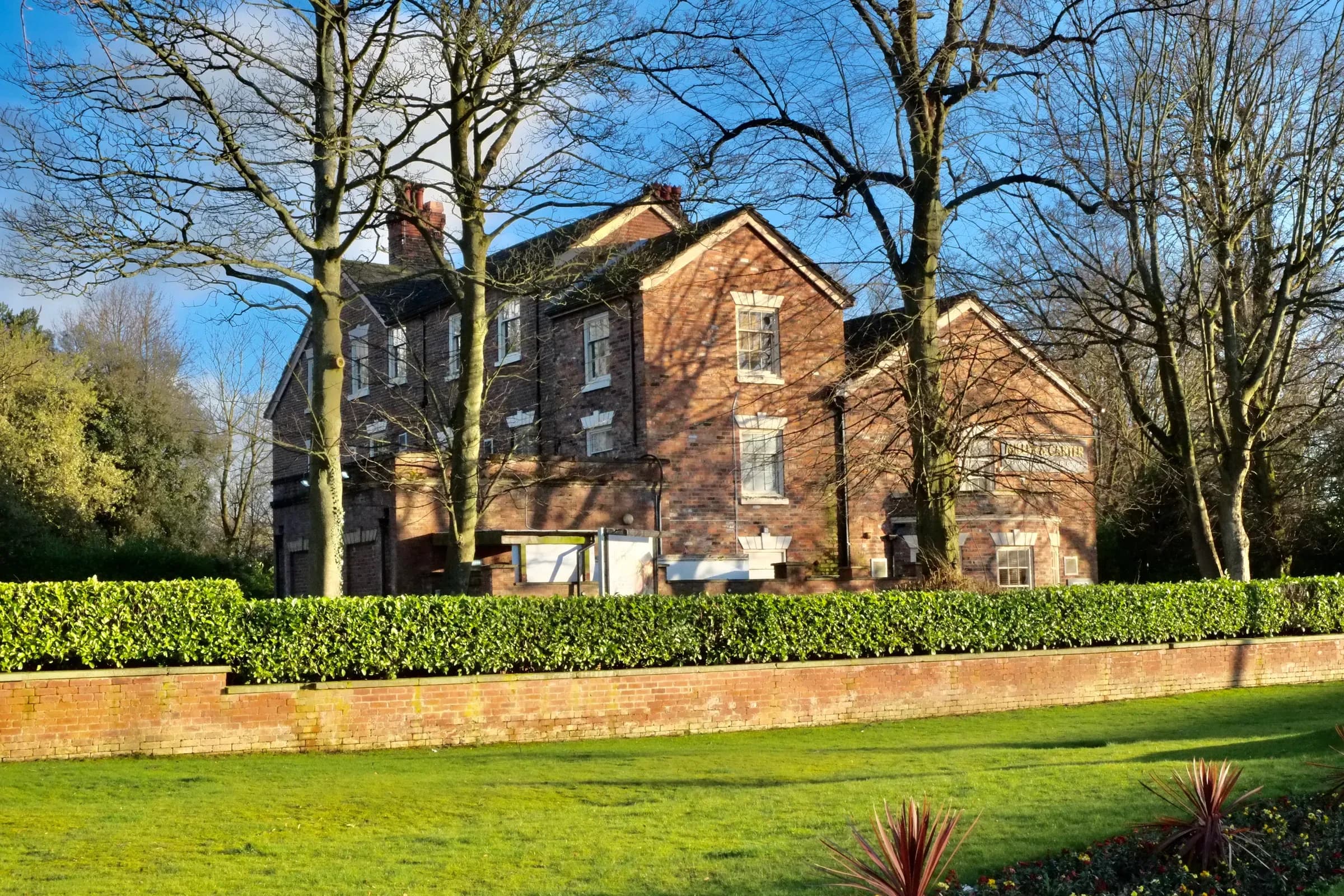 A view around Wilmslow, looking along one of the town’s tree-lined roads.